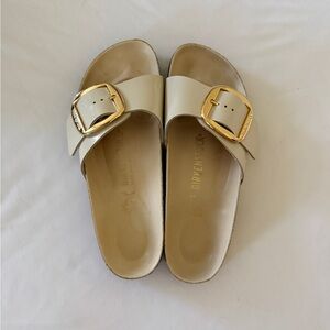 Birkenstock Single-Strap Cream Slide with Gold Buckle